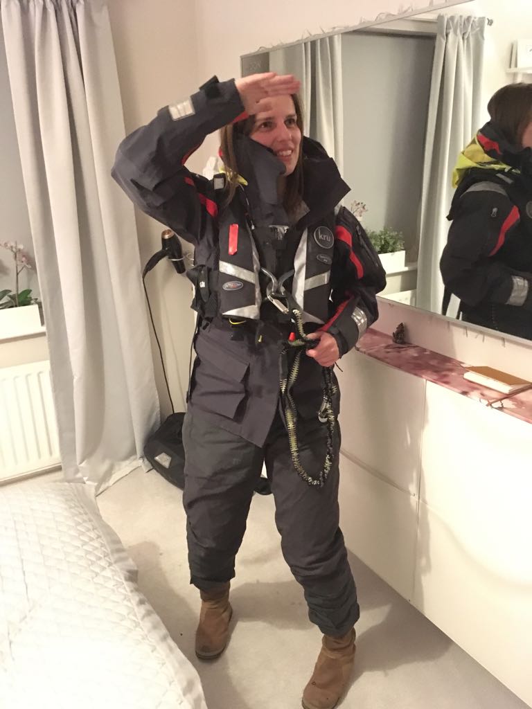 Susan trying on the wet weather kit